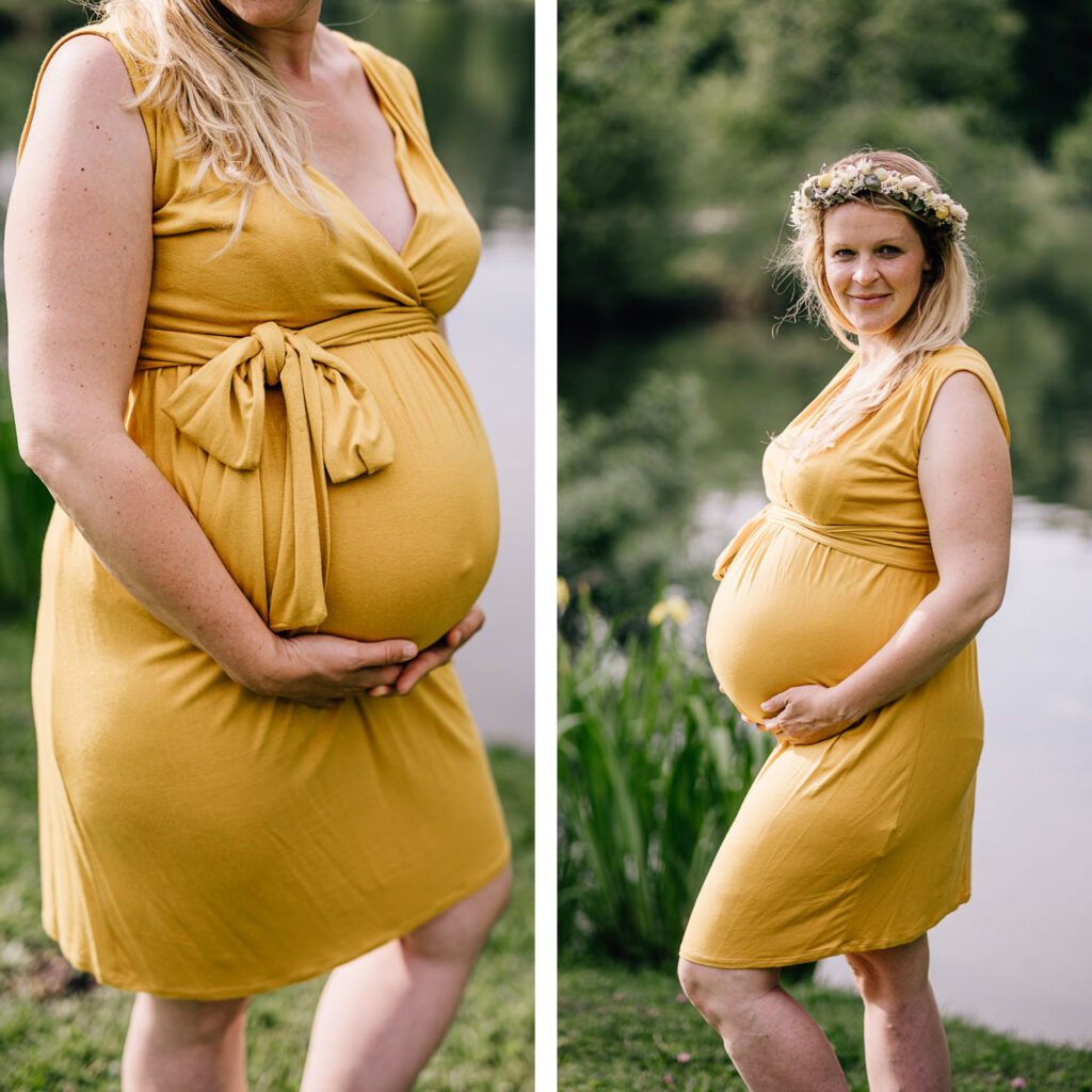 Das Bild zeigt eine schwangere Frau in einem stilvollen gelben Leihoutfit, die stolz ihren Babybauch hält. Die freundliche Atmosphäre wird durch die natürliche Umgebung und die sanfte Beleuchtung unterstrichen, die von der Fotografin Mica Zeitz eingefangen wurde.